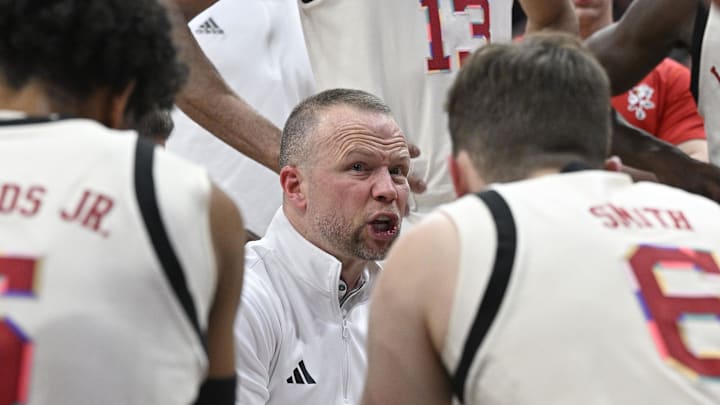 Jan 18, 2025; Louisville, Kentucky, USA;  Louisville Cardinals head coach Pat Kelsey calls a play in a time out during the second half against the Virginia Cavaliers at KFC Yum! Center. Louisville defeated Virginia 81-67. Mandatory Credit: Jamie Rhodes-Imagn Images