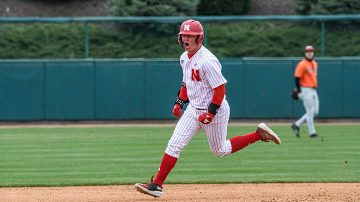Max Buttenback rounds the bases after his three-run homer as a pinch hitter in the bottom of the seventh. 