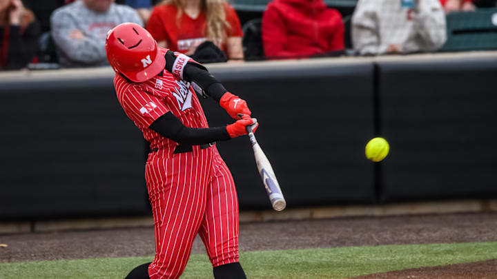 Ava Kuszak makes contact on a pitch for a double. 