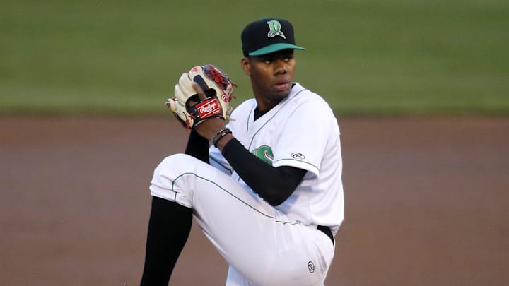 Dayton Dragons pitcher Hunter Greene (3) begins his delivery in the top of the second inning against the Lake County Captains at Fifth Third Field in Dayton on Monday, April 9, 2018.

040918 Greene