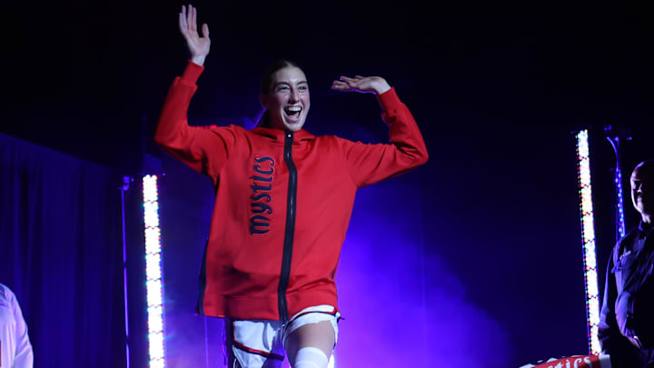 May 16, 2025; Washington, District of Columbia, USA; Washington Mystics guard Lucy Olsen (33) is introduced prior to the game against the Atlanta Dream at CareFirst Arena. Mandatory Credit: Geoff Burke-Imagn Images May 16, 2025; Washington, District of Columbia, USA; Washington Mystics guard Lucy Olsen (33) is introduced prior to the game against the Atlanta Dream at CareFirst Arena. Mandatory Credit: Geoff Burke-Imagn Images