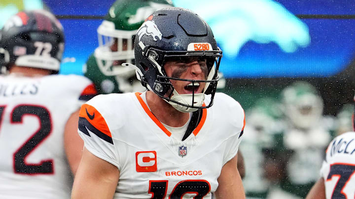 Sep 29, 2024; East Rutherford, New Jersey, USA;  Denver Broncos quarterback Bo Nix (10) celebrates the win over against the New York Jets at MetLife Stadium. Mandatory Credit: Robert Deutsch-Imagn Images