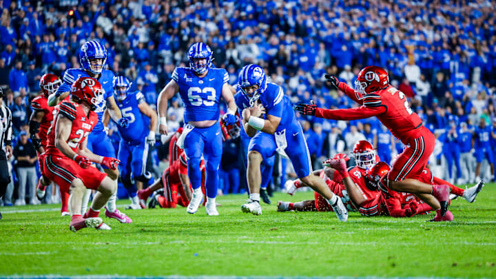 BYU quarterback Bear Bachmeier scores a touchdown against Utah BYU quarterback Bear Bachmeier scores a touchdown against Utah