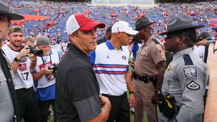 South Carolina head coach Shane Beamer, left, and Florida head coach Jon Sumrall meet mid field after an NCAA football at Steve Spurrier Field at Ben Hill Griffin Stadium in Gainesville, FL on Saturday, October 10, 2026. [Alan Youngblood/Gainesville Sun]