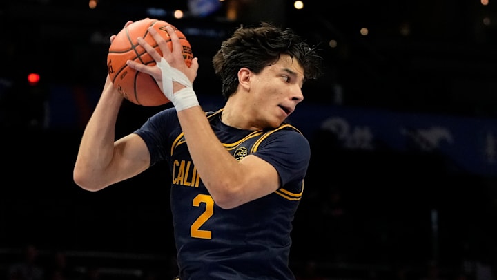 Mar 11, 2025; Charlotte, NC, USA; California Golden Bears guard Andrej Stojakovic (2) grabs a rebound in the first half at Spectrum Center.