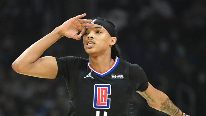 Los Angeles Clippers guard Brandon Boston Jr. (4) reacts after scoring a three point basket against the Boston Celtics during the first half at Staples Center on December 8, 2021.