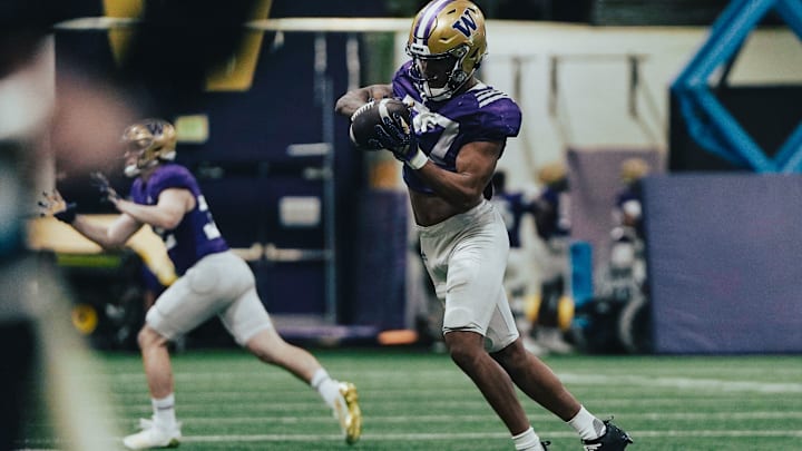 Vincent Holmes goes through an interception drill in spring.