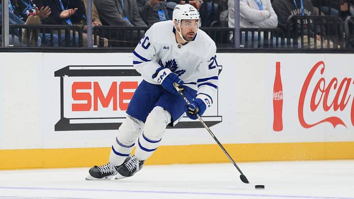 Oct 13, 2026; Salt Lake City, Utah, USA;  Toronto Maple Leafs left wing Nick Paul (20) skates with the puck against the Utah Mammoth during the third period at Delta Center.  Mandatory Credit: Rob Gray-Imagn Images