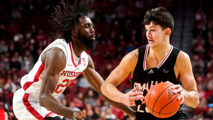 Nov 10, 2022; Lincoln, Nebraska, USA; Nebraska-Omaha Mavericks forward Frankie Fidler (23) drives against Nebraska Cornhuskers guard Emmanuel Bandoumel (25) during the second half at Pinnacle Bank Arena. Mandatory Credit: Dylan Widger-USA TODAY Sports