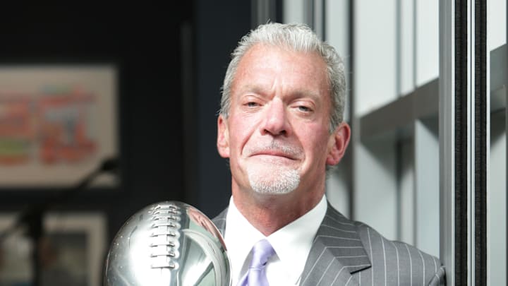 Indianapolis Colts owner and ceo Jim Irsay holds the 2006 Super Bowl XLI trophy.
