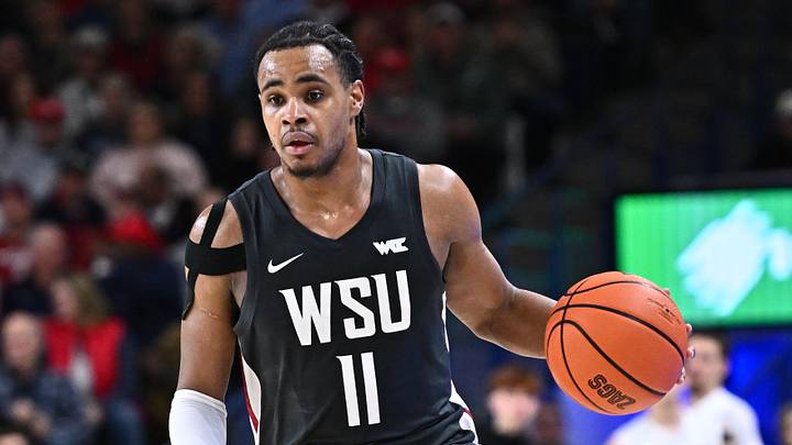 Feb 10, 2026; Spokane, Washington, USA; Washington State Cougars guard Jerone Morton (11) controls the ball against the Gonzaga Bulldogs in the second half  at McCarthey Athletic Center. Mandatory Credit: James Snook-Imagn Images