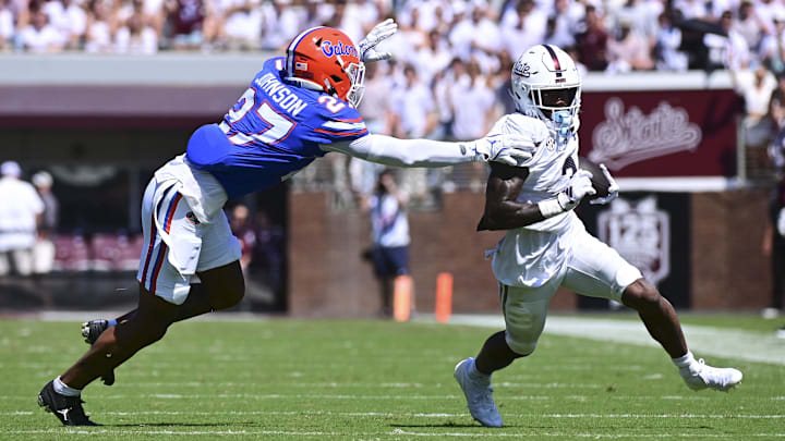 Sep 21, 2024; Starkville, Mississippi, USA; Mississippi State Bulldogs wide receiver Kevin Coleman Jr. (3) runs the ball against Florida Gators defensive back Dijon Johnson (27) during the second quarter at Davis Wade Stadium at Scott Field. Mandatory Credit: Matt Bush-Imagn Images