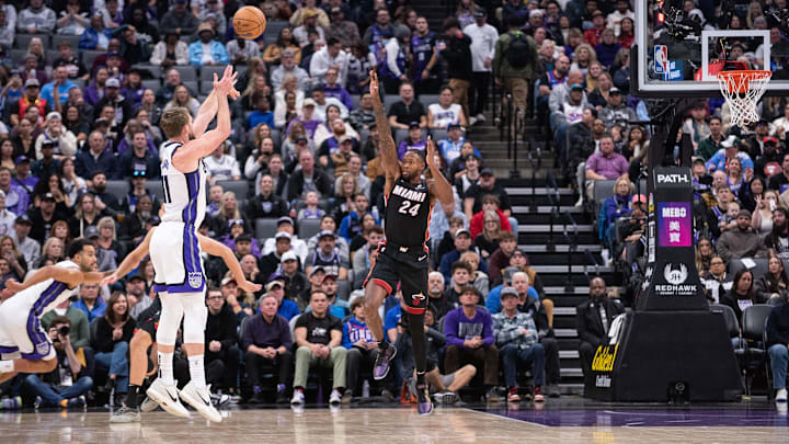 Jan 6, 2025; Sacramento, California, USA; Sacramento Kings forward Domantas Sabonis (11) takes a three point shot against Miami Heat forward Haywood Highsmith (24) during the first quarter at Golden 1 Center. Mandatory Credit: Ed Szczepanski-Imagn Images Jan 6, 2025; Sacramento, California, USA; Sacramento Kings forward Domantas Sabonis (11) takes a three point shot against Miami Heat forward Haywood Highsmith (24) during the first quarter at Golden 1 Center. Mandatory Credit: Ed Szczepanski-Imagn Images