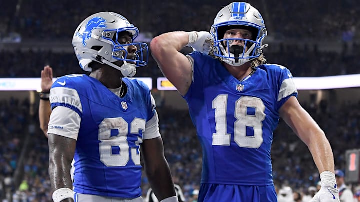 Detroit Lions wide receiver Isaac TeSlaa (18) celebrates with Detroit Lions wide receiver Jackson Meeks (83) after scoring a touchdown against the Miami Dolphins in the second quarter at Ford Field.
