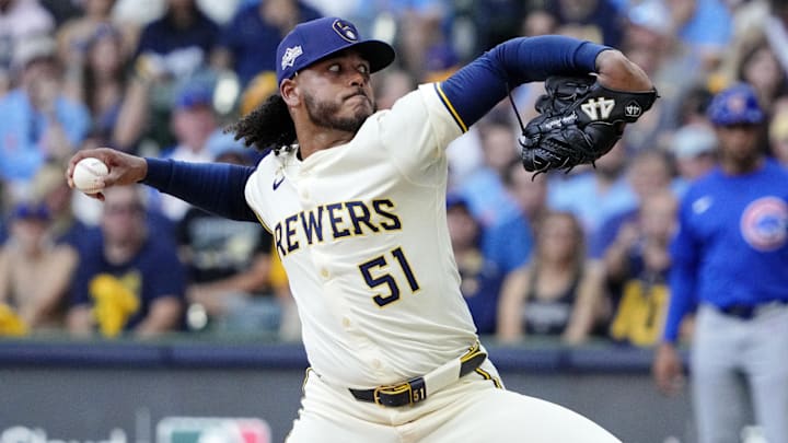 Oct 4, 2025; Milwaukee, Wisconsin, USA; Milwaukee Brewers starting pitcher Freddy Peralta (51) pitches against the Chicago Cubs during the second inning of game one of the NLDS round for the 2025 MLB playoffs at American Family Field. Mandatory Credit: Michael McLoone-Imagn Images Oct 4, 2025; Milwaukee, Wisconsin, USA; Milwaukee Brewers starting pitcher Freddy Peralta (51) pitches against the Chicago Cubs during the second inning of game one of the NLDS round for the 2025 MLB playoffs at American Family Field. Mandatory Credit: Michael McLoone-Imagn Images