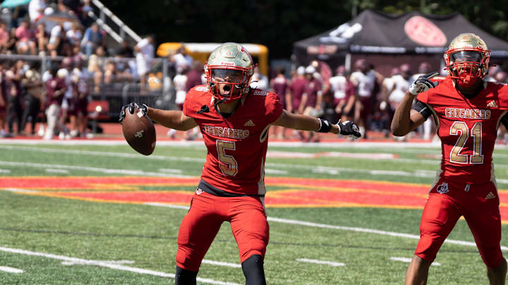 Sept 2, 2023; Oradell, NJ, USA; Iona Prep (NY) at Bergen Catholic (NJ) in a high school football game on Saturday, Sept. 2, 2023. BC #5 Naiim Parrish celebrates after making a catch for an interception in the second quarter. Mandatory Credit: Michael Karas-The Record