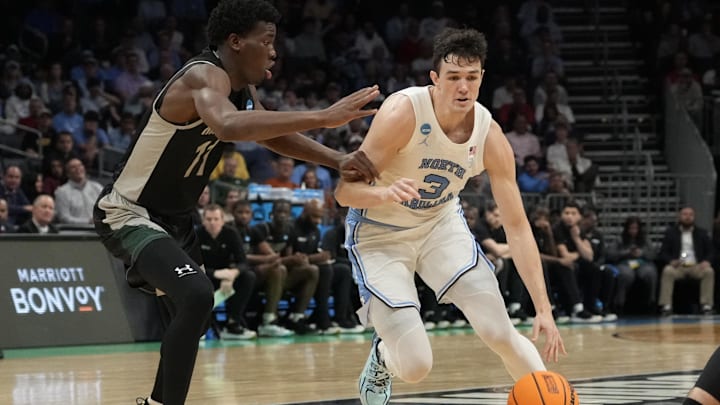 March 21, 2024, Charlotte, NC, USA; North Carolina Tar Heels guard Cormac Ryan (3) drives against