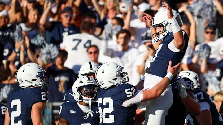 Dominic Rulli lifts and celebrates with Ethan Grunkemeyer in Penn State vs. Nevada game