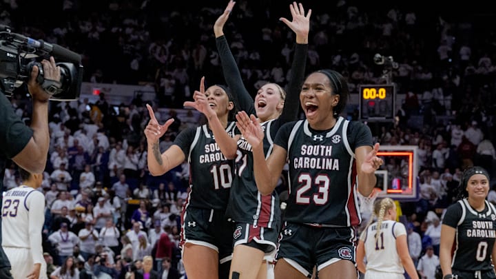 South Carolina basketball starters Bree Hall, Chloe Kitts, and Kamilla Cardoso after the Gamecocks knocked off LSU in Baton Rouge this season.