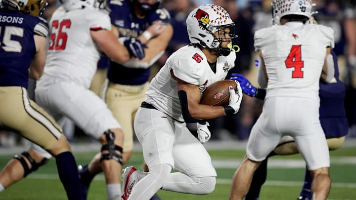 Illinois State running back Victor Dawson (5) runs the ball during the first half of the FCS National Championship Illinois State running back Victor Dawson (5) runs the ball during the first half of the FCS National Championship