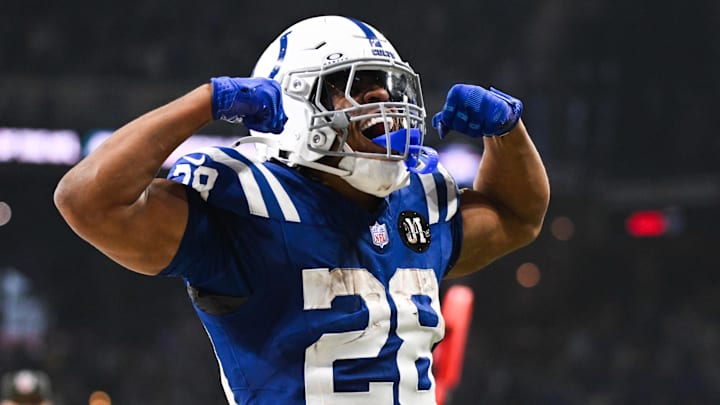 Indianapolis Colts running back Jonathan Taylor (28) celebrates after scoring a touchdown during the third quarter against the Tennessee Titans at Lucas Oil Stadium. Indianapolis Colts running back Jonathan Taylor (28) celebrates after scoring a touchdown during the third quarter against the Tennessee Titans at Lucas Oil Stadium.
