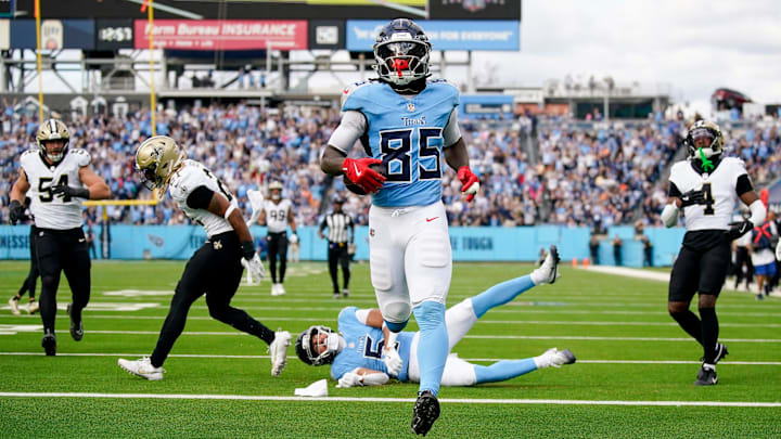 Tennessee Titans tight end Chig Okonkwo (85) runs in a touchdown against the New Orleans Saints
