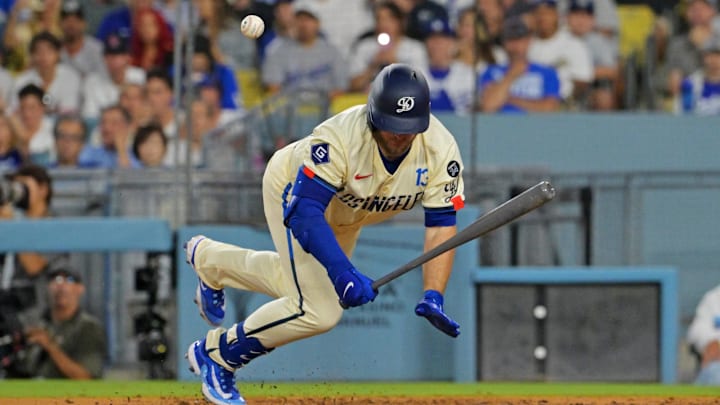 Sep 20, 2025; Los Angeles, California, USA; Los Angeles Dodgers third base Max Muncy (13) jumps out of the way after being hit by the ball during the third inning against the San Francisco Giants at Dodger Stadium. Mandatory Credit: Jayne Kamin-Oncea-Imagn Images Sep 20, 2025; Los Angeles, California, USA; Los Angeles Dodgers third base Max Muncy (13) jumps out of the way after being hit by the ball during the third inning against the San Francisco Giants at Dodger Stadium. Mandatory Credit: Jayne Kamin-Oncea-Imagn Images