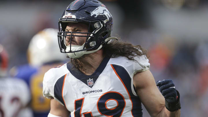 Dec 10, 2023; Inglewood, California, USA; Denver Broncos inside linebacker Alex Singleton (49) celebrates in the first half in a game against the Los Angeles Chargers at SoFi Stadium. Mandatory Credit: Yannick Peterhans-Imagn Images