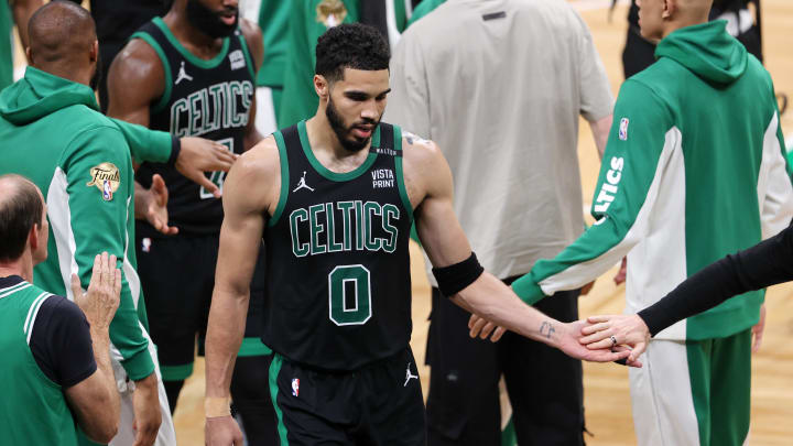 Jun 9, 2024; Boston, Massachusetts, USA; Boston Celtics forward Jayson Tatum (0) walks to the bench during the fourth quarter in game two of the 2024 NBA Finals at TD Garden. Mandatory Credit: Peter Casey-USA TODAY Sports