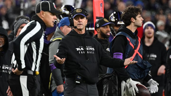 Jan 28, 2024; Baltimore, Maryland, USA; Baltimore Ravens head coach John Harbaugh (center) questions a call against the Kansas City Chiefs during the second half in the AFC Championship football game at M&T Bank Stadium. Mandatory Credit: Tommy Gilligan-USA TODAY Sports