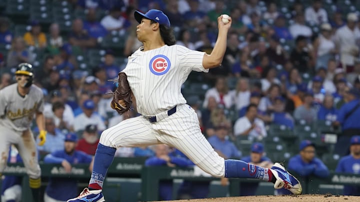 Sep 16, 2024; Chicago, Illinois, USA; Chicago Cubs pitcher Shota Imanaga (18) throws the ball against the Oakland Athletics during the first inning at Wrigley Field. 