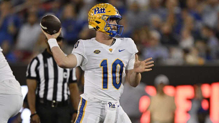 Nov 2, 2024; Dallas, Texas, USA; Pittsburgh Panthers quarterback Eli Holstein (10) passes against the Southern Methodist Mustangs during the first half at Gerald J. Ford Stadium. Mandatory Credit: Jerome Miron-Imagn Images