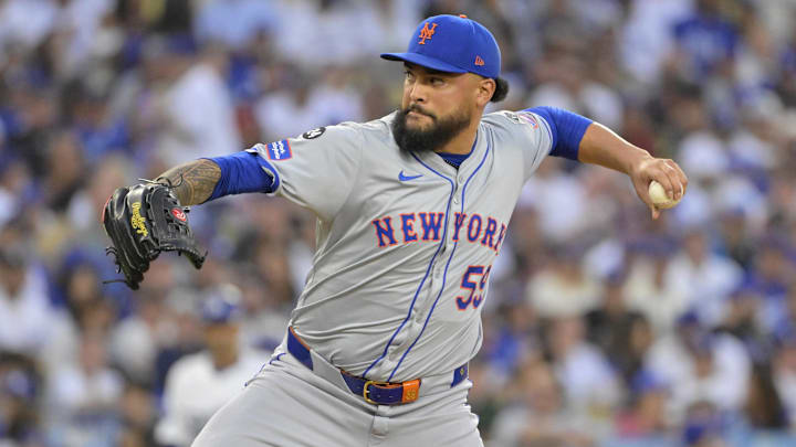 Oct 20, 2024; Los Angeles, California, USA; New York Mets pitcher Sean Manaea (59) pitches against the Los Angeles Dodgers in the second inning during game six of the NLCS for the 2024 MLB playoffs at Dodger Stadium. 