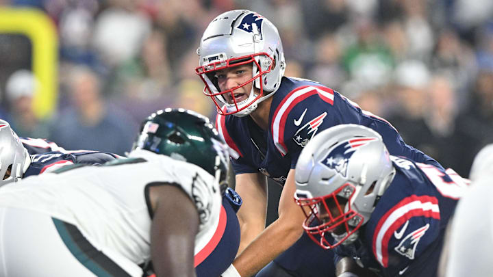 Aug 15, 2024; Foxborough, Massachusetts, USA; New England Patriots quarterback Drake Maye (10) waits for a snap against the Philadelphia Eagles zduring the first half at Gillette Stadium. Mandatory Credit: Brian Fluharty-Imagn Images