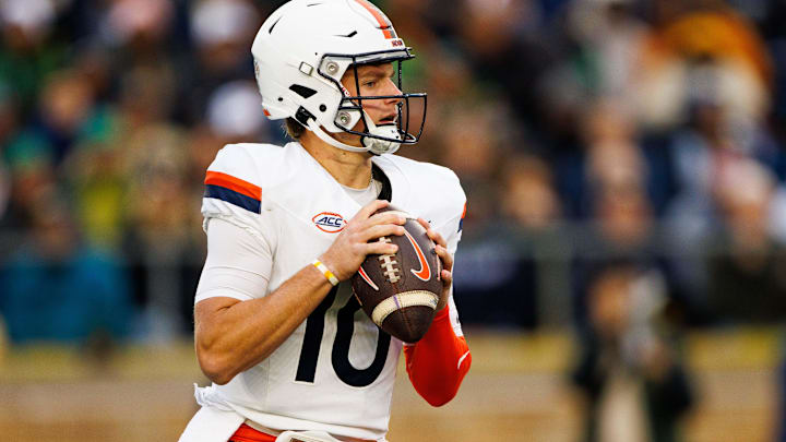 Virginia quarterback Anthony Colandrea (10) looks for an open receiver during a NCAA college football game against Notre Dame Virginia quarterback Anthony Colandrea (10) looks for an open receiver during a NCAA college football game against Notre Dame
