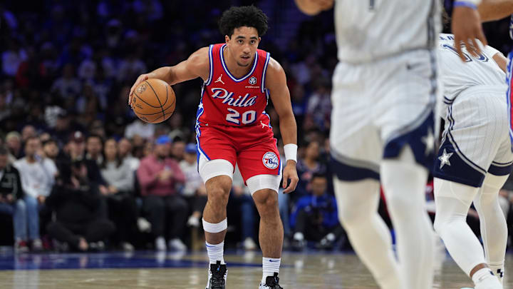 Dec 6, 2024; Philadelphia, Pennsylvania, USA; Philadelphia 76ers guard Jared McCain (20) controls the ball against the Orlando Magic in the fourth quarter at Wells Fargo Center. Mandatory Credit: Kyle Ross-Imagn Images