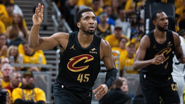 May 9, 2025; Indianapolis, Indiana, USA; Cleveland Cavaliers guard Donovan Mitchell (45) celebrates a made basket during game three of the second round for the 2025 NBA Playoffs against the Indiana Pacers at Gainbridge Fieldhouse. Mandatory Credit: Trevor Ruszkowski-Imagn Images