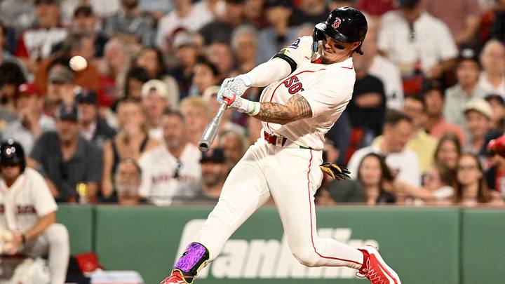 Jun 16, 2026; Boston, Massachusetts, USA; Boston Red Sox left fielder Jarren Duran (16) hits a solo home run against the Toronto Blue Jays during the eighth inning at Fenway Park. Mandatory Credit: Brian Fluharty-Imagn Images
