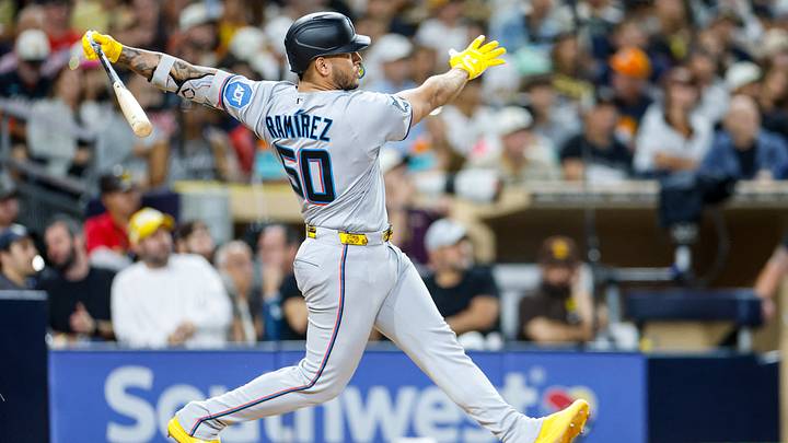 Miami Marlins designated hitter Agustin Ramirez (50) hits a one-run home run.  Credit: David Frerker-Imagn Images