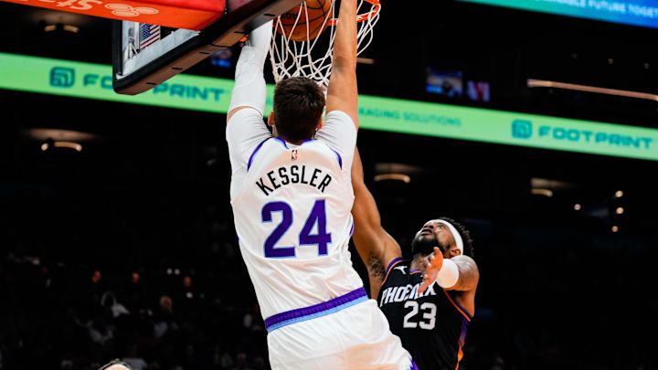 Oct 31, 2025; Phoenix, Arizona, USA; Utah Jazz center Walker Kessler (24) dunks in the first half between the Phoenix Suns and the Utah Jazz at Mortgage Matchup Center. Mandatory Credit: Arianna Grainey-Imagn Images