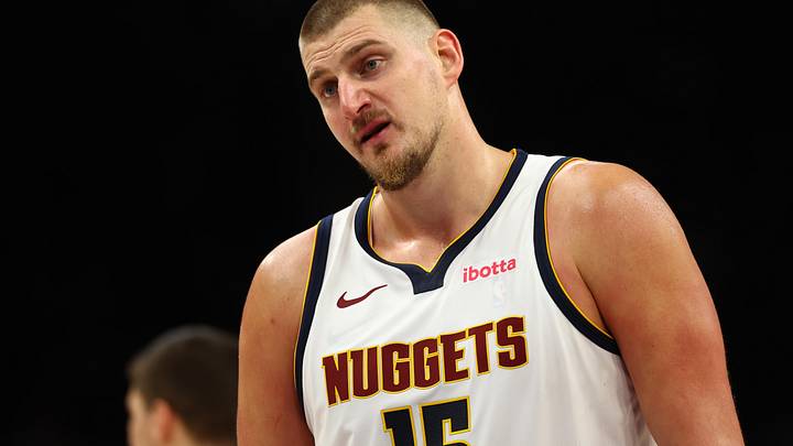 Nov 29, 2025; Phoenix, Arizona, USA; Denver Nuggets center Nikola Jokic (15) against the Phoenix Suns at the Mortgage Matchup Center.