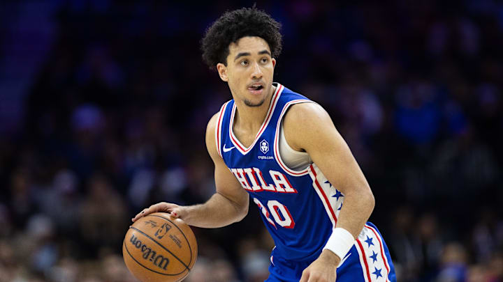 Dec 4, 2024; Philadelphia, Pennsylvania, USA; Philadelphia 76ers guard Jared McCain (20) controls the ball against the Orlando Magic during the fourth quarter at Wells Fargo Center. Mandatory Credit: Bill Streicher-Imagn Images
