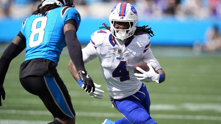 Oct 26, 2025; Charlotte, North Carolina, USA; Buffalo Bills running back James Cook III (4) runs against Carolina Panthers cornerback Jaycee Horn (8) during the first half at Bank of America Stadium. Mandatory Credit: Jim Dedmon-Imagn Images Oct 26, 2025; Charlotte, North Carolina, USA; Buffalo Bills running back James Cook III (4) runs against Carolina Panthers cornerback Jaycee Horn (8) during the first half at Bank of America Stadium. Mandatory Credit: Jim Dedmon-Imagn Images