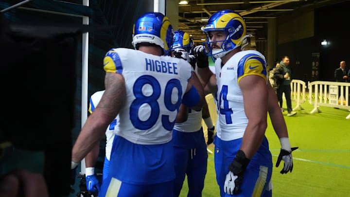 Oct 19, 2025; London, United Kingdom; Los Angeles Rams tight end Tyler Higbee (89), tight end Colby Parkinson (84), running back Ronnie Rivers (20), tight end Davis Allen (87) and tight end Terrance Ferguson (18) huddle and during a NFL International Series game against the Jacksonville Jaguars at Wembley Stadium. Mandatory Credit: Kirby Lee-Imagn Images