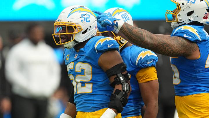 Sep 20, 2026; Inglewood, California, USA;  Los Angeles Chargers linebacker Khalil Mack (52) and Los Angeles Chargers linebacker Tuli Tuipulotu (45) react after a play against the Las Vegas Raiders during the first half at SoFi Stadium.  Mandatory Credit: Kirby Lee-Imagn Images