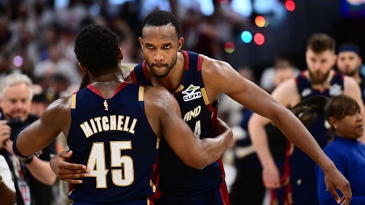 May 9, 2026; Cleveland, Ohio, USA; Cleveland Cavaliers guard Donovan Mitchell (45) hugs center Evan Mobley (4) after game three against the Detroit Pistons in the second round of the 2026 NBA Playoffs at Rocket Arena. Mandatory Credit: Ken Blaze-Imagn Images