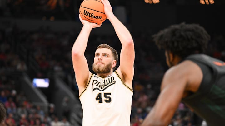 Purdue Boilermakers center Oscar Cluff (45) shoots a free throw