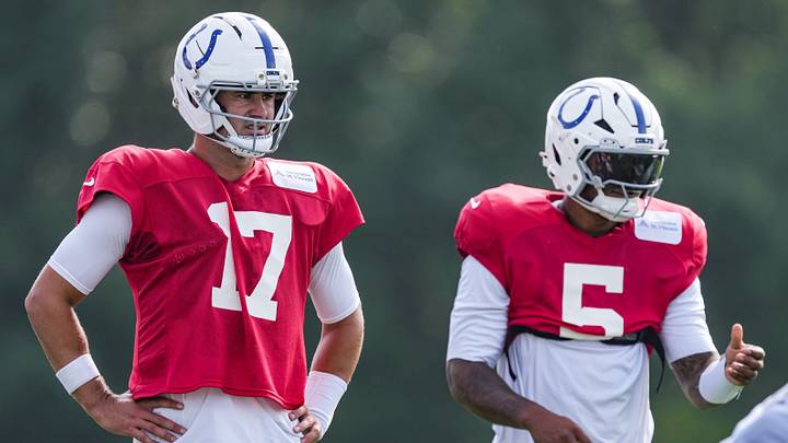 Indianapolis Colts quarterback Daniel Jones (17) waits between drills with Indianapolis Colts quarterback Anthony Richardson Sr. (5) on Monday, Aug. 3, 2026, during practice at Colts Camp at Grand Park in Westfield.