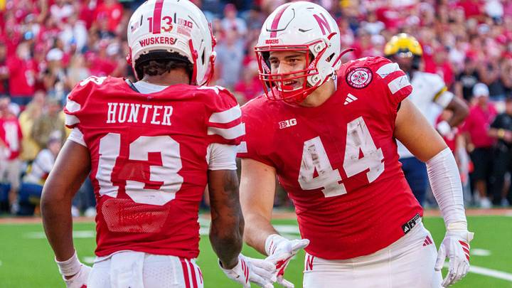 Sep 20, 2025; Lincoln, Nebraska, USA; Nebraska Cornhuskers tight end Luke Lindenmeyer (44) and wide receiver Nyziah Hunter (13) celebrate after a call against the Michigan Wolverines during the fourth quarter at Memorial Stadium. Mandatory Credit: Dylan Widger-Imagn Images Sep 20, 2025; Lincoln, Nebraska, USA; Nebraska Cornhuskers tight end Luke Lindenmeyer (44) and wide receiver Nyziah Hunter (13) celebrate after a call against the Michigan Wolverines during the fourth quarter at Memorial Stadium. Mandatory Credit: Dylan Widger-Imagn Images