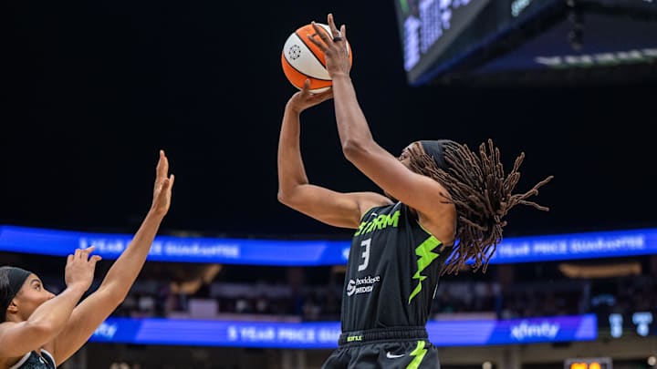 Sep 5, 2025; Seattle, Washington, USA;  Seattle Storm forward Nneka Ogwumike (3) shoots the ball against New York Liberty forward Isabelle Harrison (21) during the second half at Climate Pledge Arena. Mandatory Credit: Stephen Brashear-Imagn Images